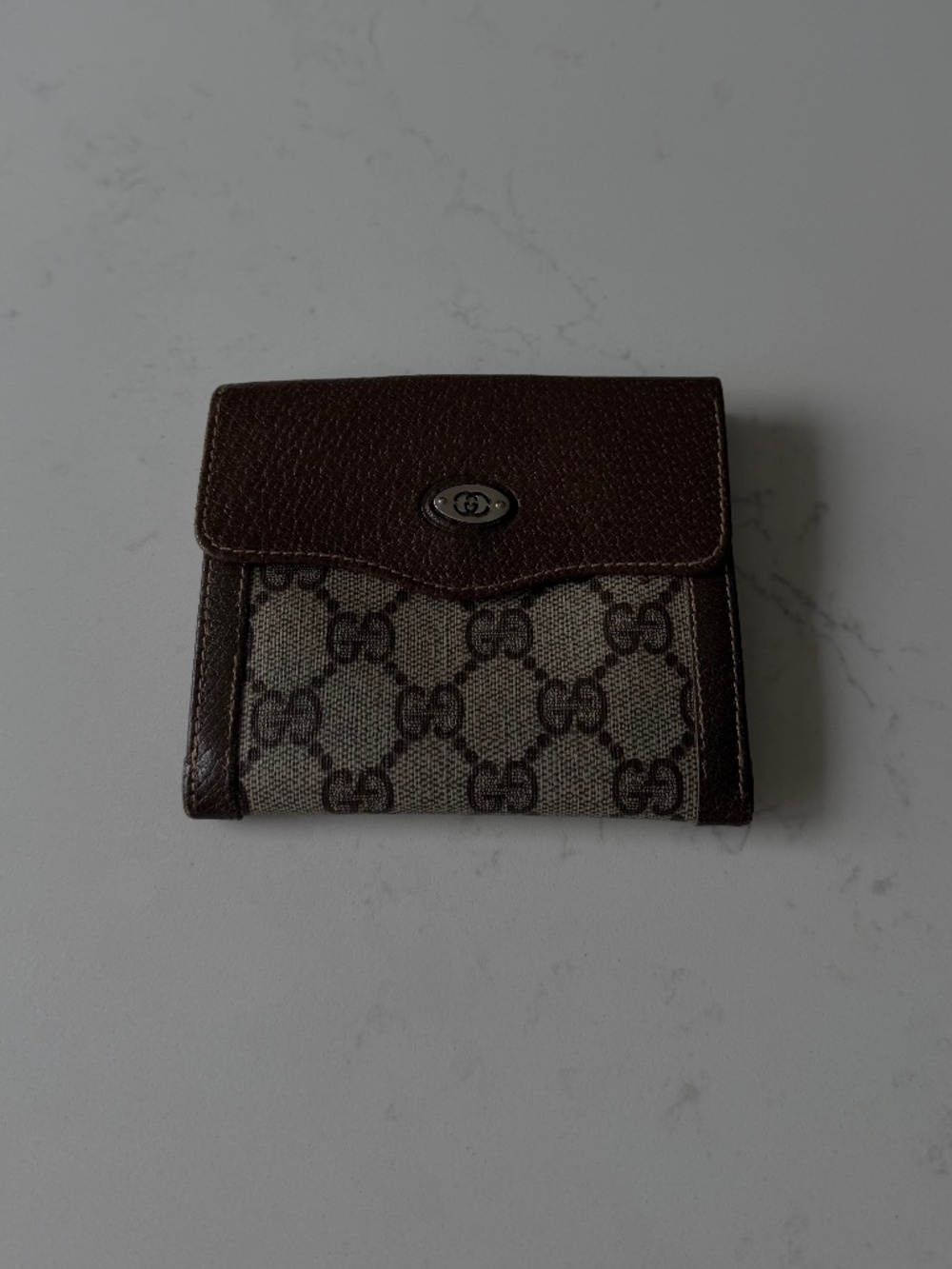 Gucci Authentic vintage compact bifold wallet featuring the iconic GG monogram